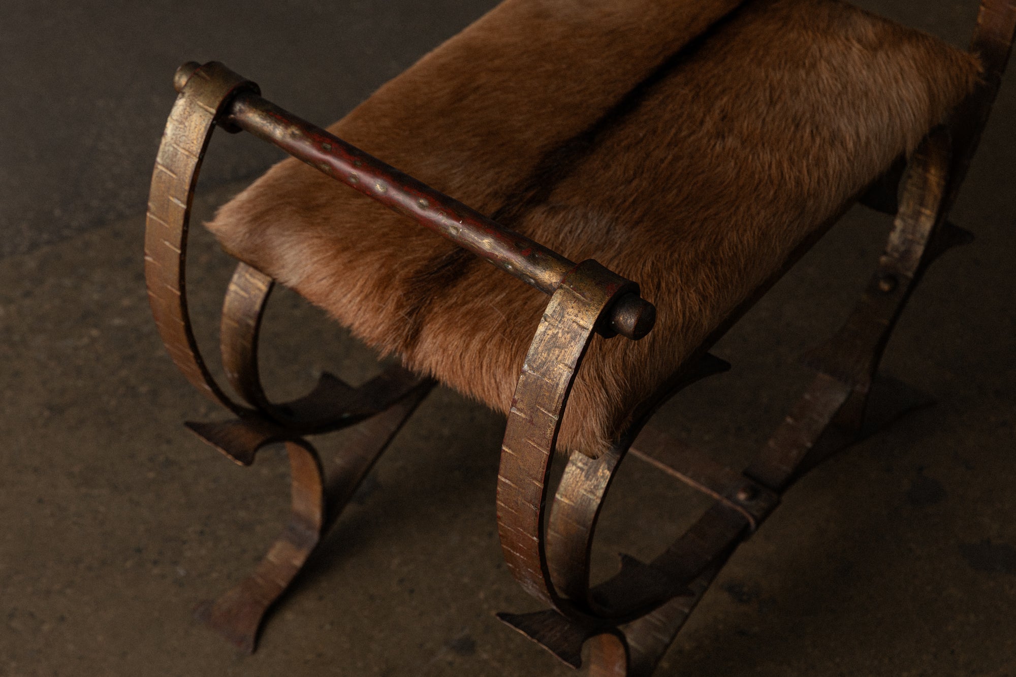Curved Metal and Hide Stool