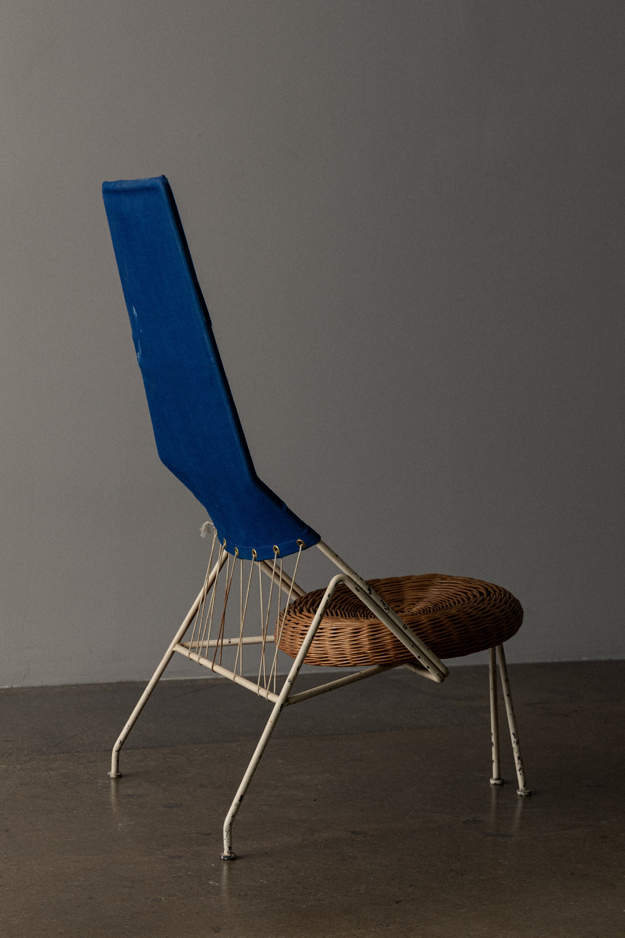 Pair of Triangular Lounge Chairs by Tony Paul