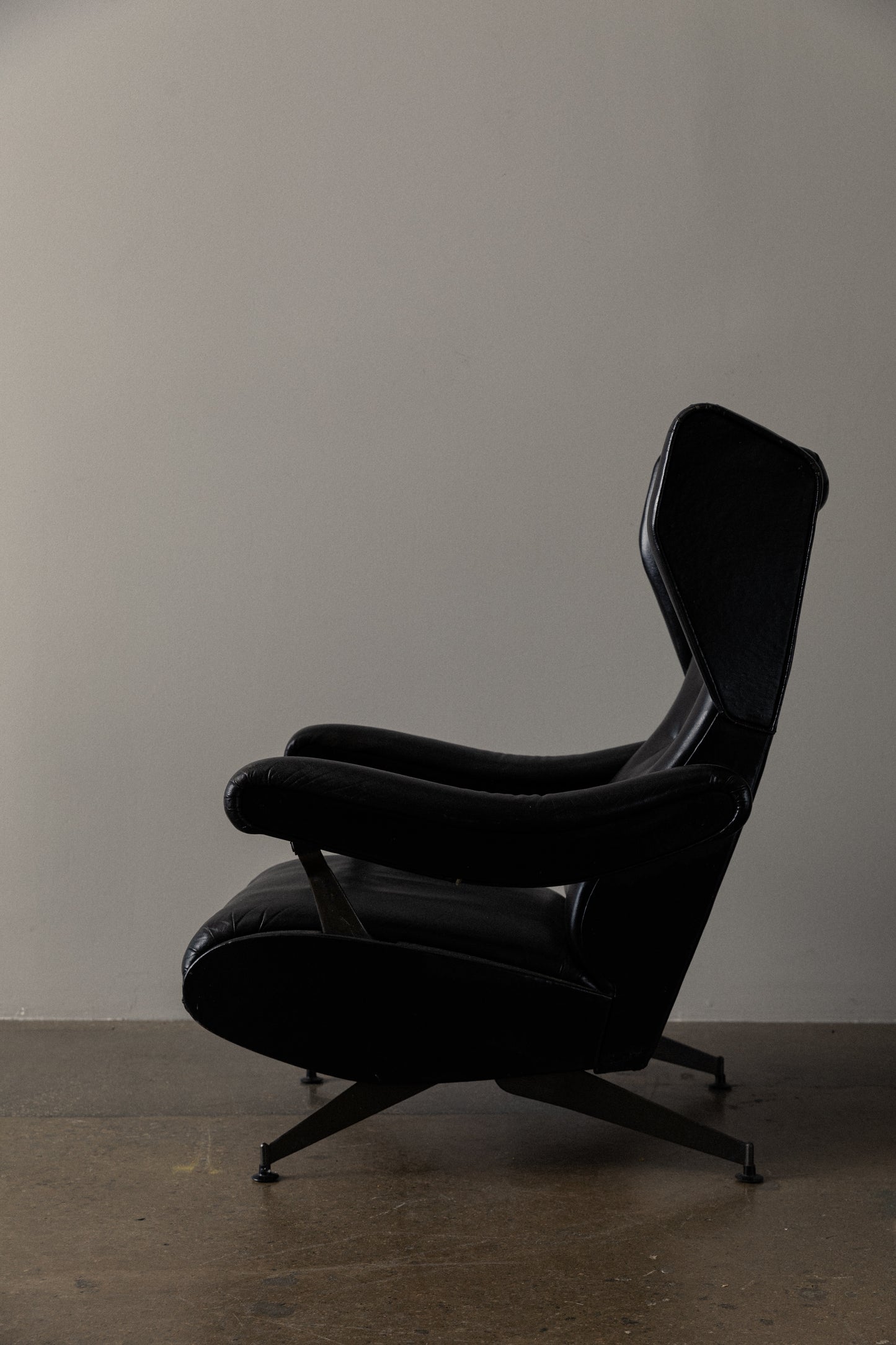 Pair of Italian Reclining Black Leather Armchairs