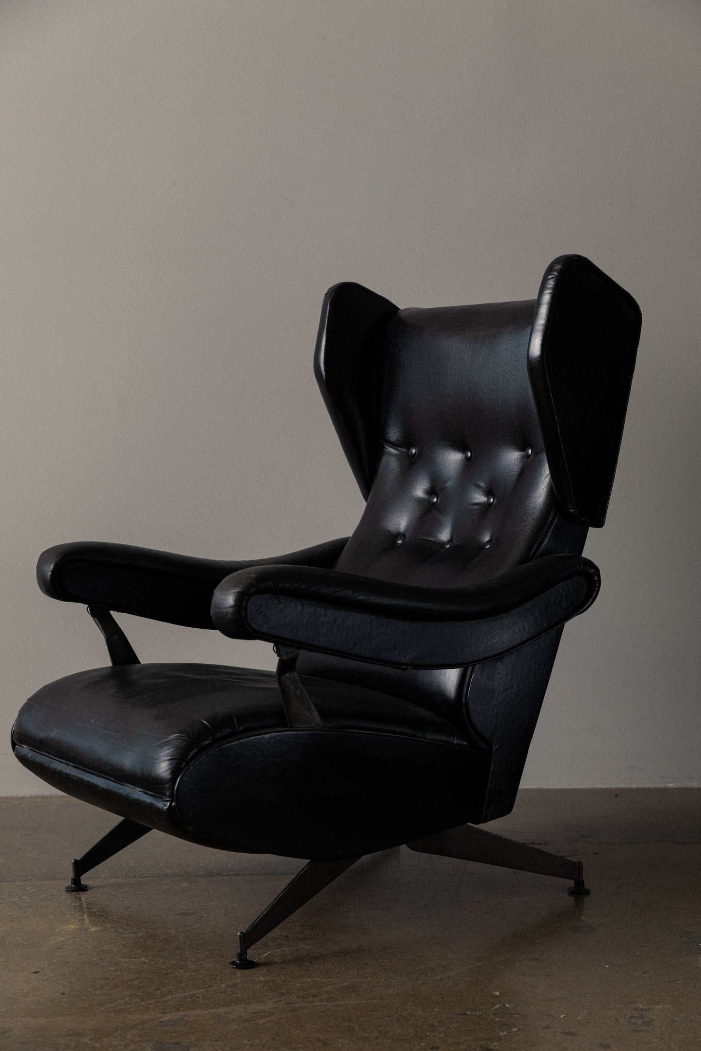 Pair of Italian Reclining Black Leather Armchairs